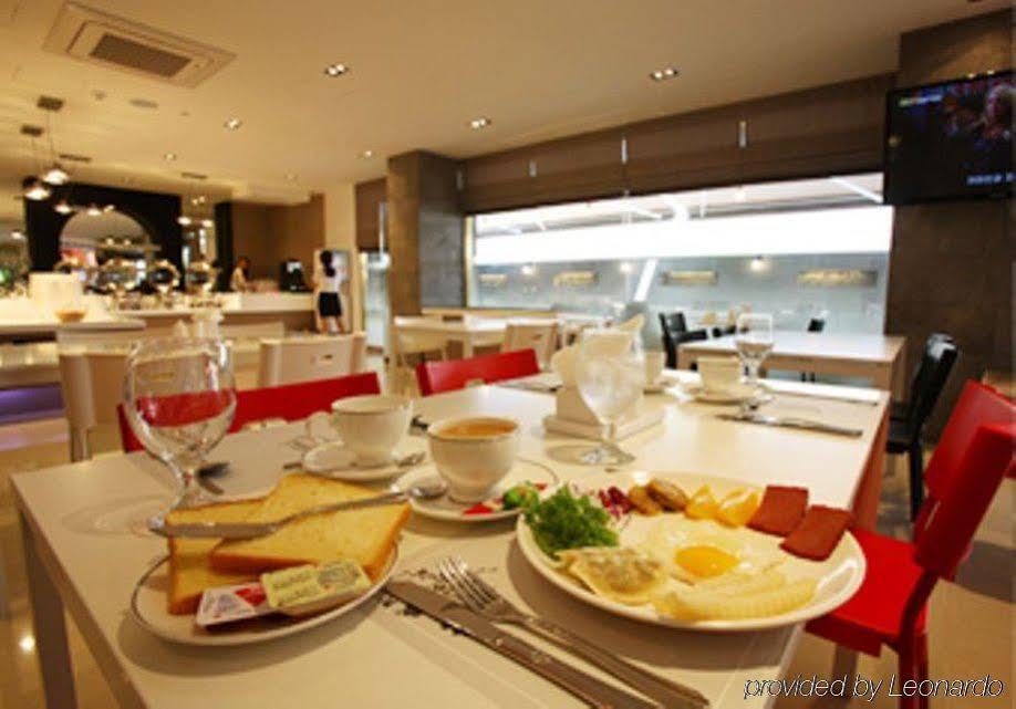 Suwon Reve Hotel Restoran foto